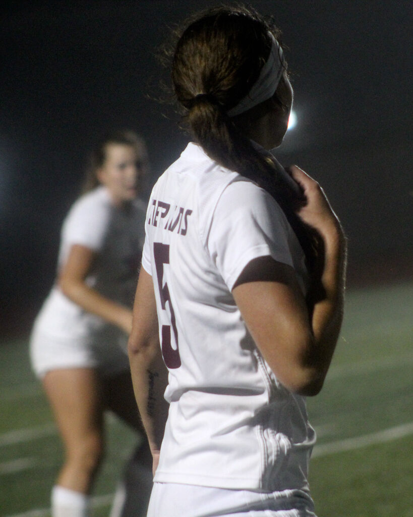 Sophomore Peyton Lane looks to where the main play is going on in their first game of the season on Wednesday